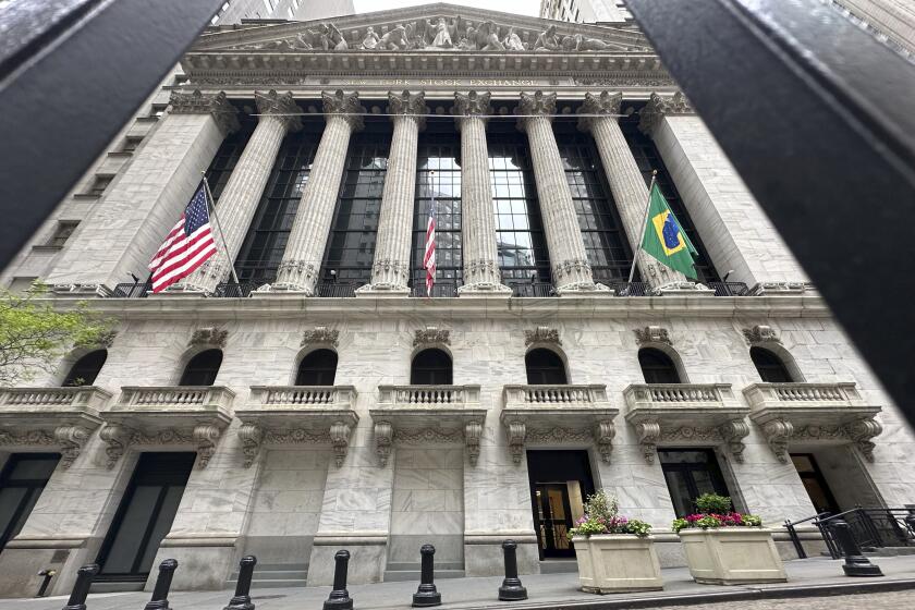 FILE - The New York Stock Exchange is shown on Thursday, May, 16, 2024, in New York. World stocks have advanced on Monday, May 20, 2024, after U.S. stock indexes drifted near their records on Friday with the Dow Jones Industrial Average finishing above 40,000 for the first time. (AP Photo/Peter Morgan, File)