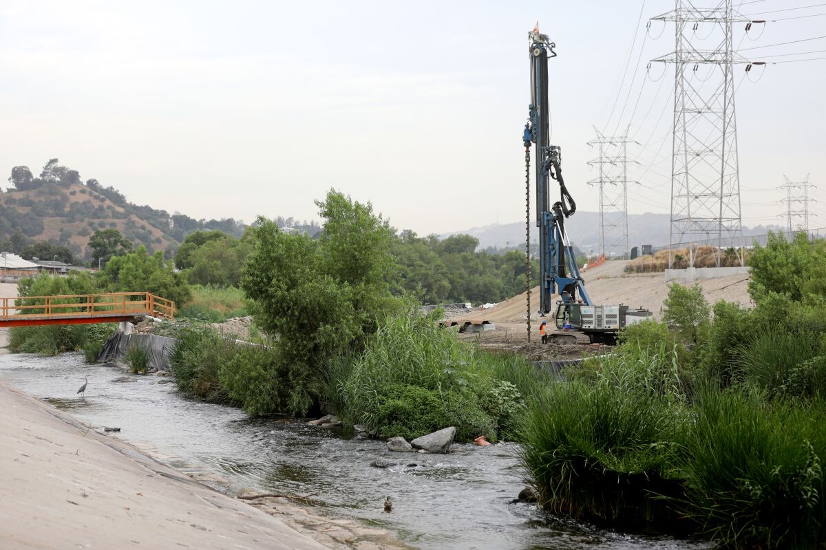 A drilling rig near the property of Steven Appleton, who runs a kayak rental business in the Los Angeles River and has bought a parcel of private land that straddles the river in the Frogtown neighborhood.