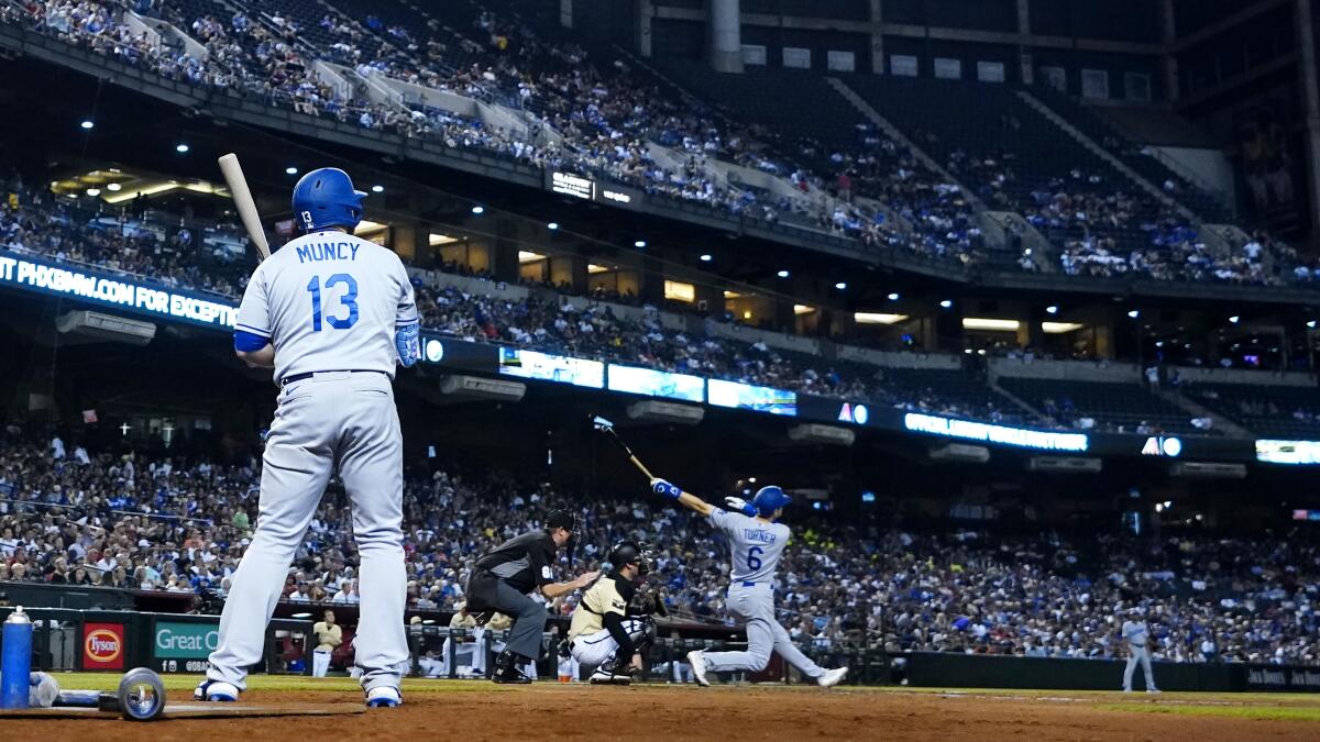 Julio Urías, Trea Turner help Dodgers tie Giants for 1st in NL West