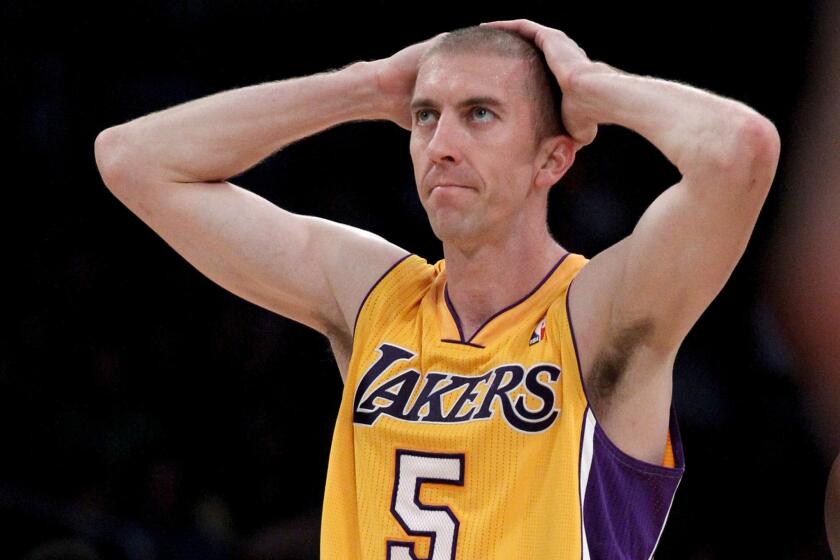 Lakers point guard Steve Blake reacts after committing a foul in the fourth quarter.