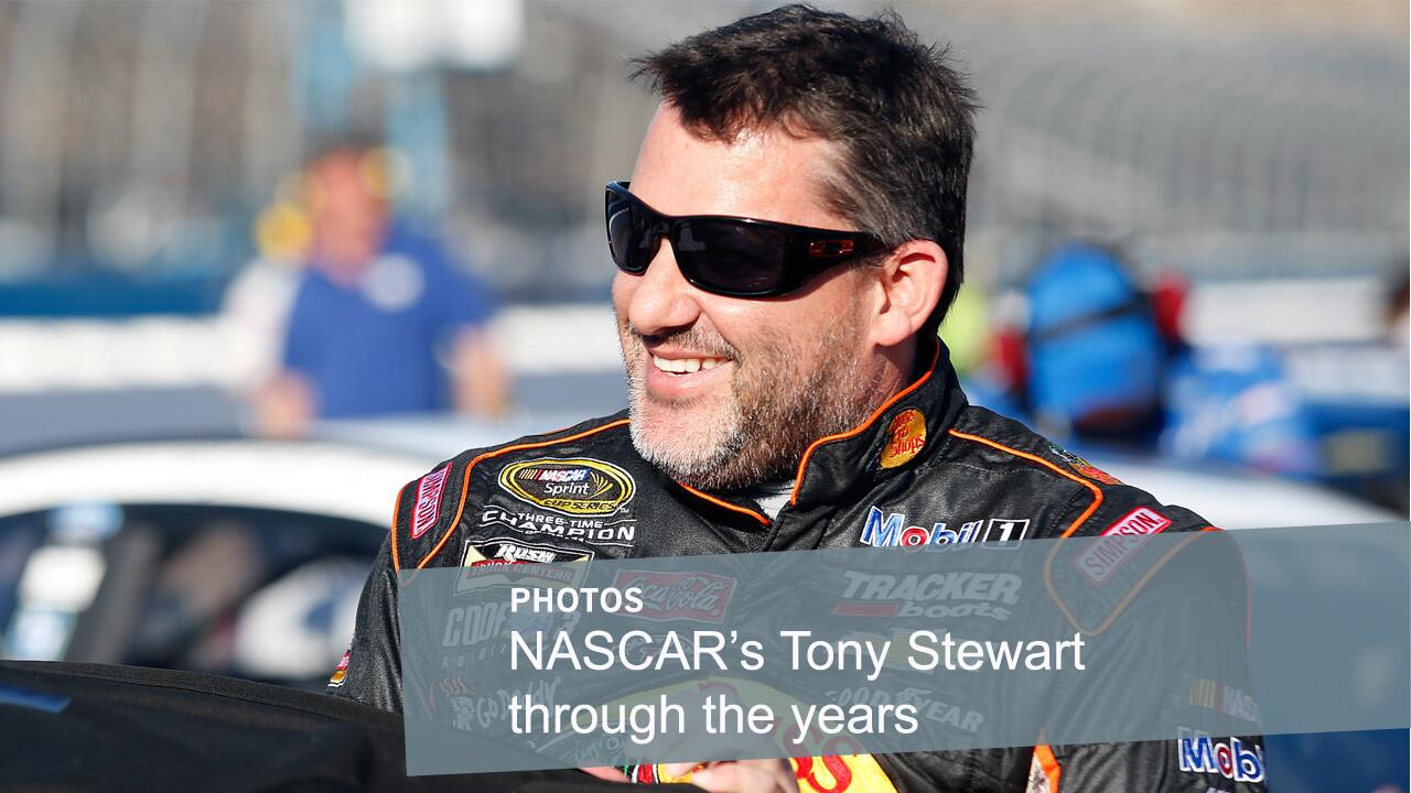 NASCAR Sprint Cup driver Tony Stewart smiles during qualifying at Phoenix International Raceway on March 13, 2015.