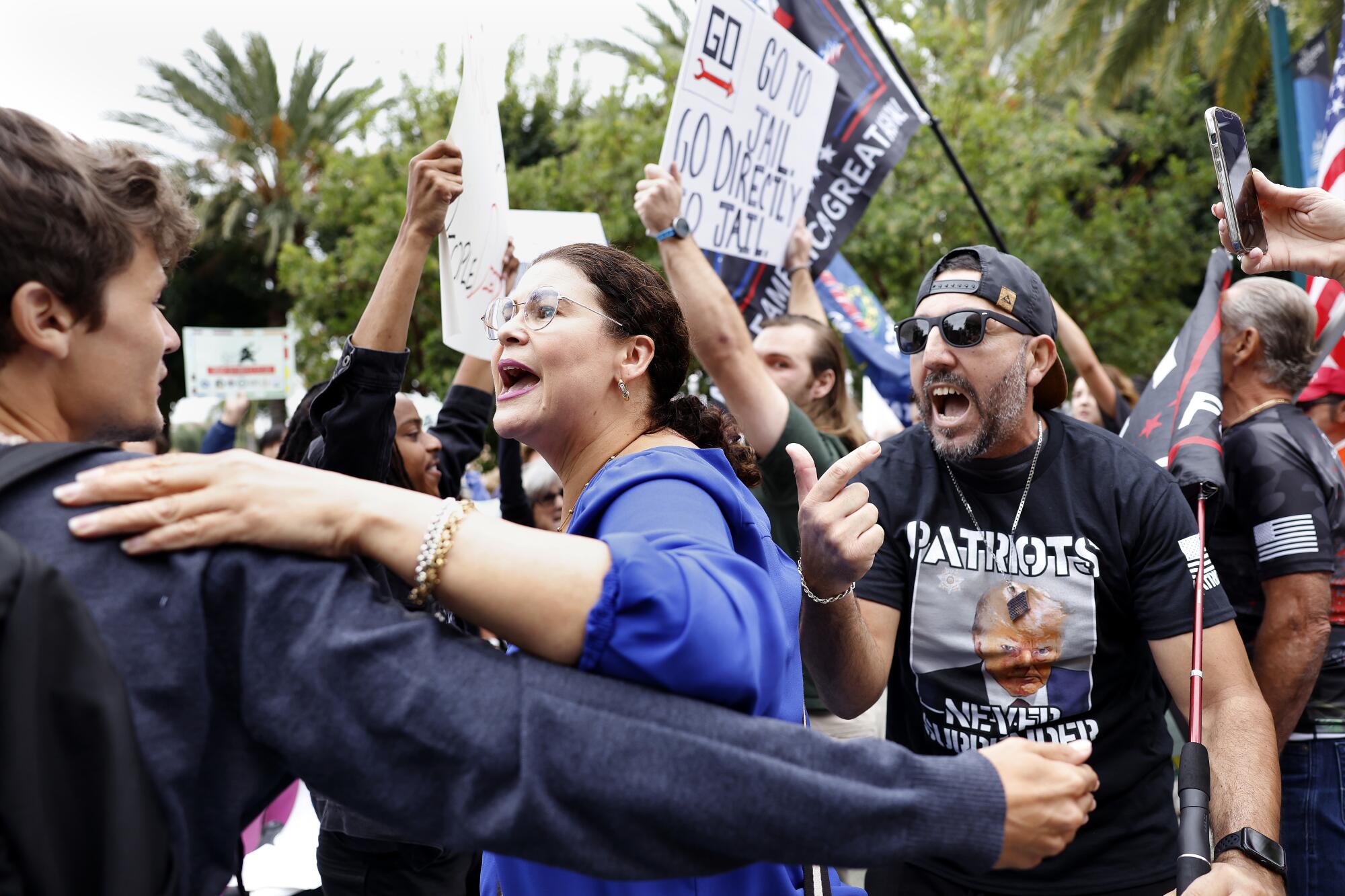 A confrontation outside the California Republican Party Convention at the Anaheim Marriott Hotel