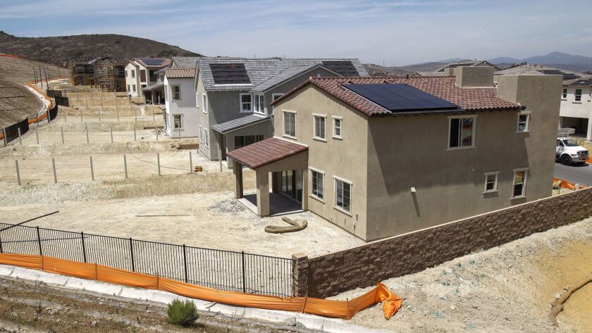 San Diego County’s median home price hit $575,000 in June. Pictured: The Weston housing development in Santee in May.