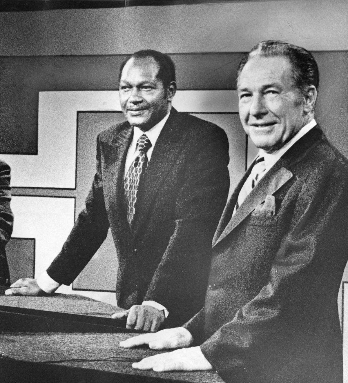 City Councilman Tom Bradley and Mayor Sam Yorty in TV studio before the start of a debate during their 1973 mayoral campaign.