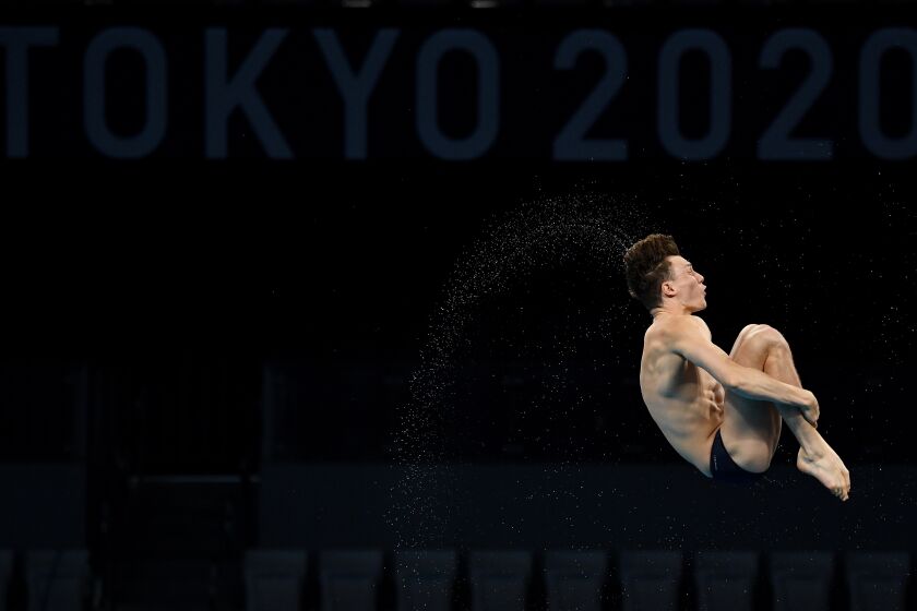-TOKYO,JAPAN July 26, 2021: A diver dives during warm-ups at the 2020 Tokyo Olympics. (Wally Skalij /Los Angeles Times)