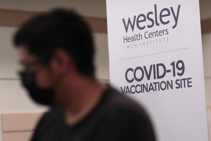 Bell, CA, Monday, April 5, 2021 - Covid-19 vaccinations are offered at the Bell Community Center the day it is announced that 4 million shots have been provided to underserved communities. (Robert Gauthier/Los Angeles Times)