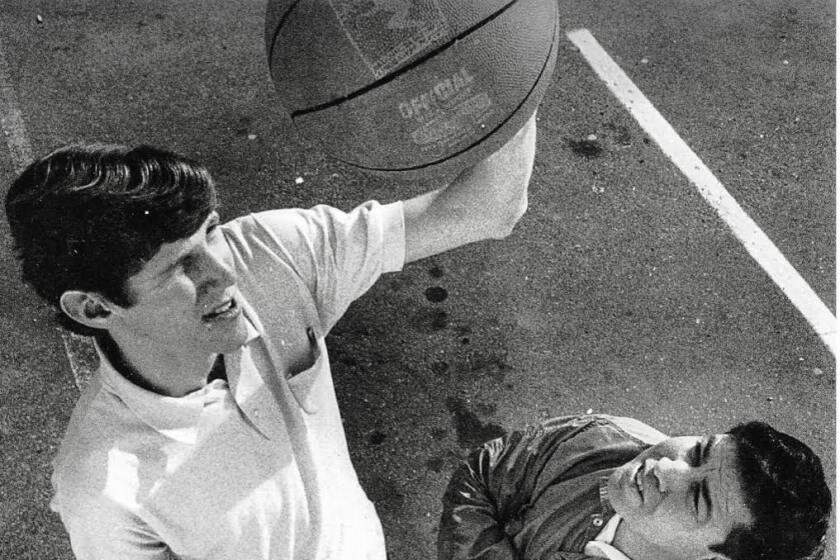 A young Bill Walton, left, was mentored in sports and life by late community volunteer Frank 'Rocky' Graciano.