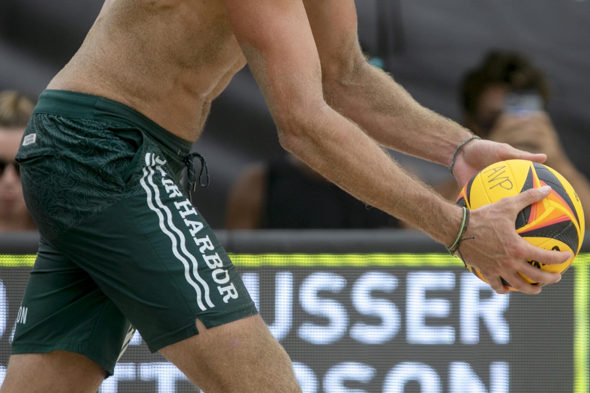 Volleyball players and fans enjoy the finals at the AVP Hermosa Beach Open