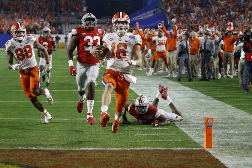 Clemson’s Trevor Lawrence completes a 67-yard touchdown run in the Fiesta Bowl on Dec. 28, 2019.