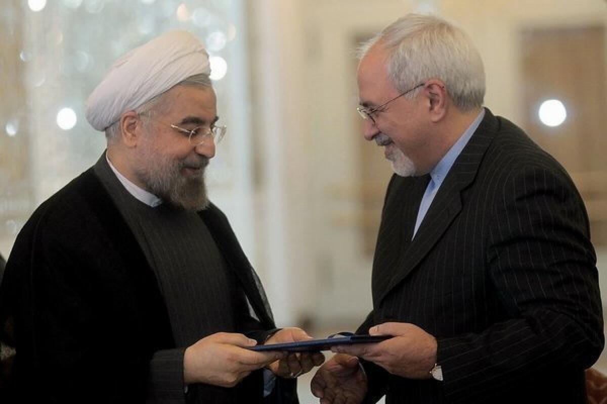 Iranian President Hassan Rouhani, left, with Foreign Minister Mohammad Javad Zarif in Tehran on Aug. 17.