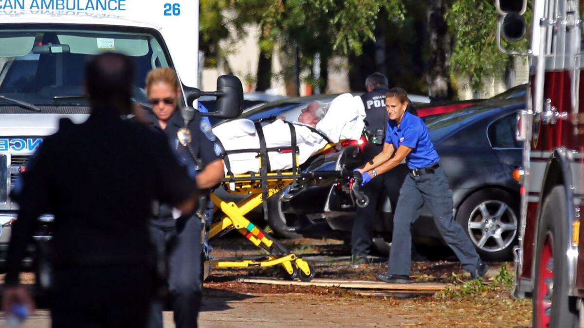 A woman is transported from the Rehabilitation Center at Hollywood Hills on Sept. 13 as patients are evacuated after a loss of air conditioning due to Hurricane Irma in Hollywood, Fla.