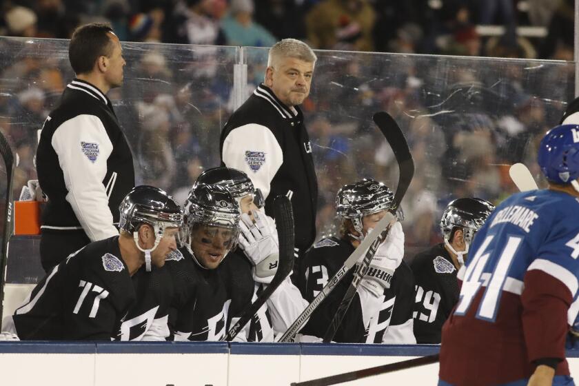 Los Angeles Kings head coach Todd McLellan in the first period of an NHL hockey game Saturday, Feb. 15, 2020, at Air Force Academy, Colo. (AP Photo/David Zalubowski)