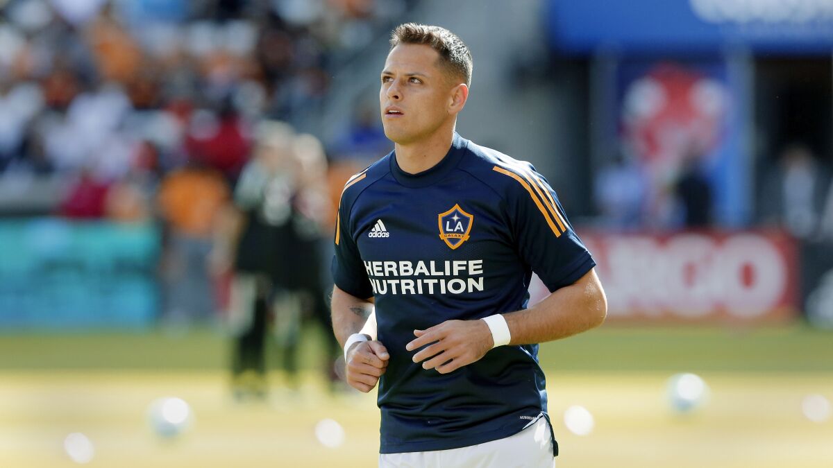 Galaxy forward Javier "Chicharito" Hernández warms up before a game.