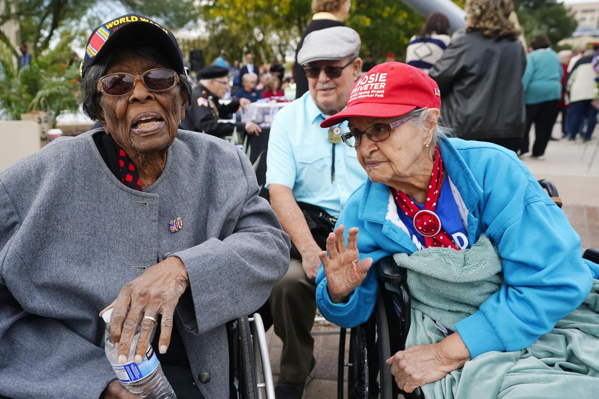 WWII veteran Fannie Griffin McClendon, left,  and Erlinda Gallegos.
