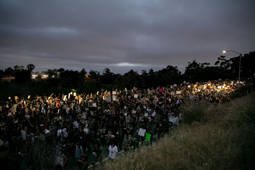 Thousands of protestors demanding racial justice in the United States march down Pershing Drive toward downtown San Diego on June 4, 2020 in San Diego, California.