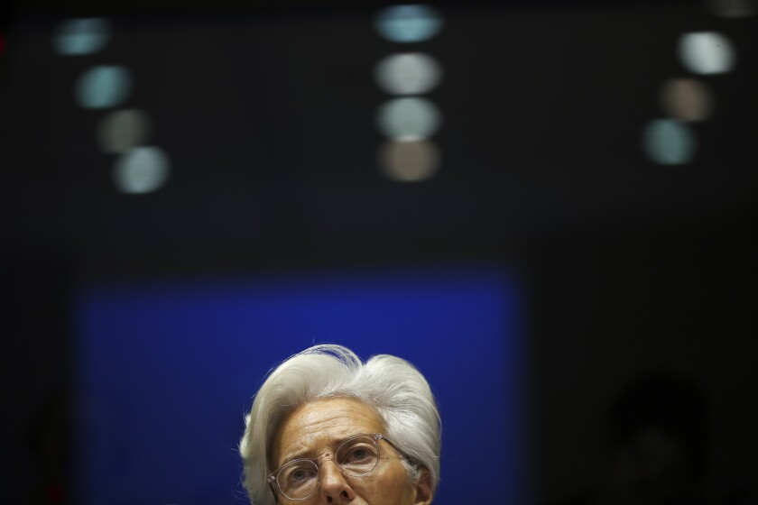 European Central Bank President Christine Lagarde addresses European Parliament lawmakers during a monetary dialogue meeting at the European Parliament in Brussels, Thursday, Feb. 6, 2020. (AP Photo/Francisco Seco)
