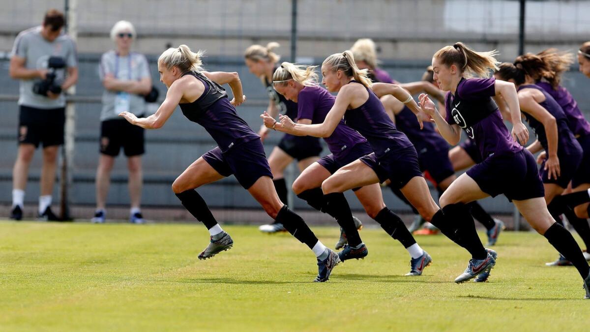 England players run during a training session in Cannes, France, on Tuesday.