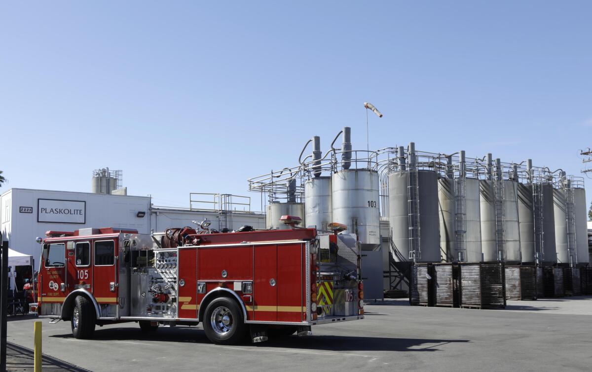 A firetruck outside a factory