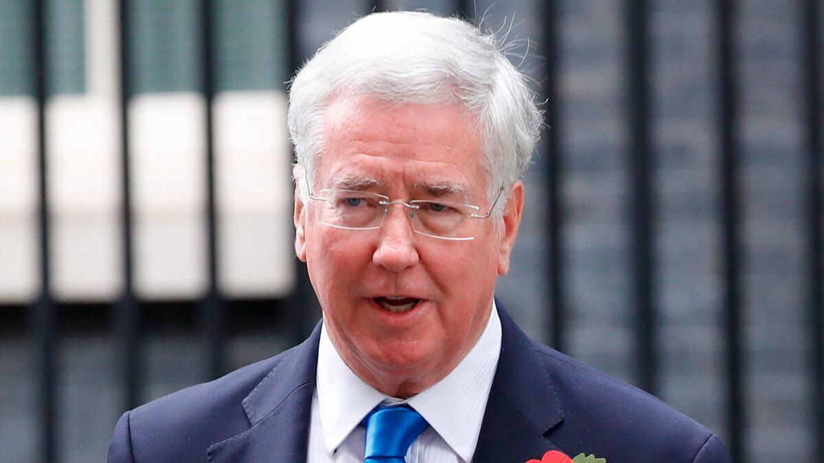 British Defense Secretary Michael Fallon leaves 10 Downing St. on Oct. 31, 2017, after the weekly meeting of the Cabinet. Fallon has resigned.
