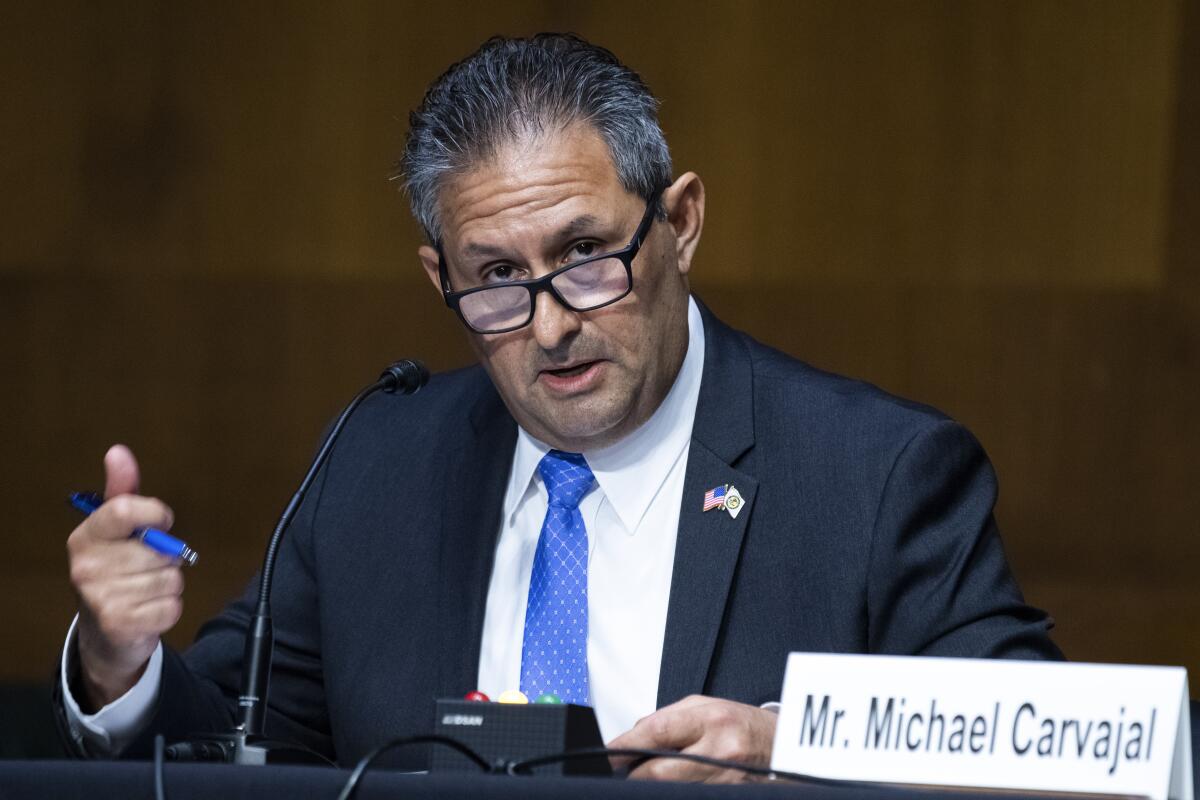 FILE - Michael Carvajal, director of the Federal Bureau of Prisons, testifies during a Senate Judiciary Committee hearing examining issues facing prisons and jails during the coronavirus pandemic on Capitol Hill in Washington, on June 2, 2020. Carvajal, the outgoing director of the Bureau of Prisons has been subpoenaed to testify before a Senate committee examining abuse and corruption in the beleaguered federal agency. The subpoena was announced Monday, July 18, 2022, by Sen. Jon Ossoff, the chairman of the U.S. Senate Permanent Subcommittee on Investigations. (Tom Williams/Pool Photo via AP, File)
