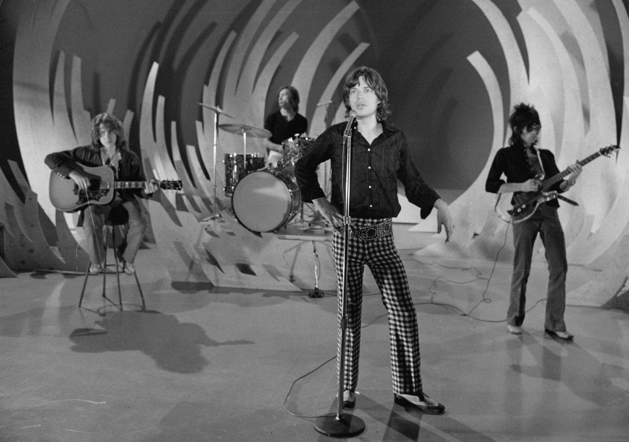The Rolling Stones rehearse onstage for an appearance on "The Ed Sullivan Show" in 1969.