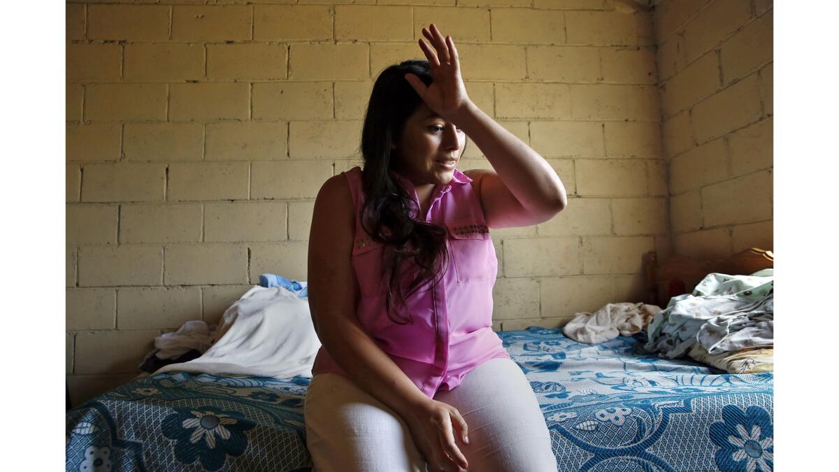 Mayra Machado, 31, was deport back to El Salvador in 2017, away from her three children. She is now living in rural El Salvador with family friends and is afraid to leave the house.