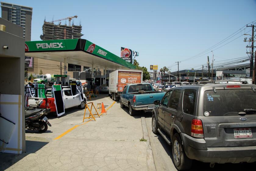 Tijuana, Baja California - May 22: A blockage at the PEMEX plant in Playas de Rosarito has caused a gasoline shortage at gas stations in Tijuana, Rosarito, and Tecate. Customers wait in line to fill up in Colonia Aviacion on Wednesday, May 22, 2024 in Tijuana, Baja California. (Alejandro Tamayo / The San Diego Union-Tribune)