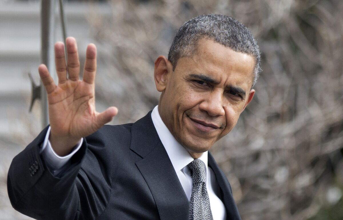 President Obama waves as he leaves the White House in Washington for Arden, N.C. to discuss proposals unveiled in his State of the Union speech.