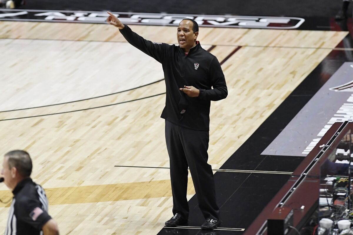 North Carolina State coach Kevin Keatts gestures to the team during the first half of an NCAA college basketball game against UMass-Lowell, Thursday, Dec. 3, 2020, in Uncasville, Conn. (AP Photo/Jessica Hill)