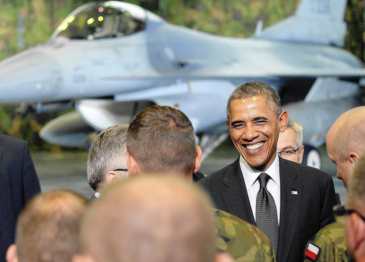 President Obama meets with U.S. and Polish airmen at Warsaw Chopin Airport.