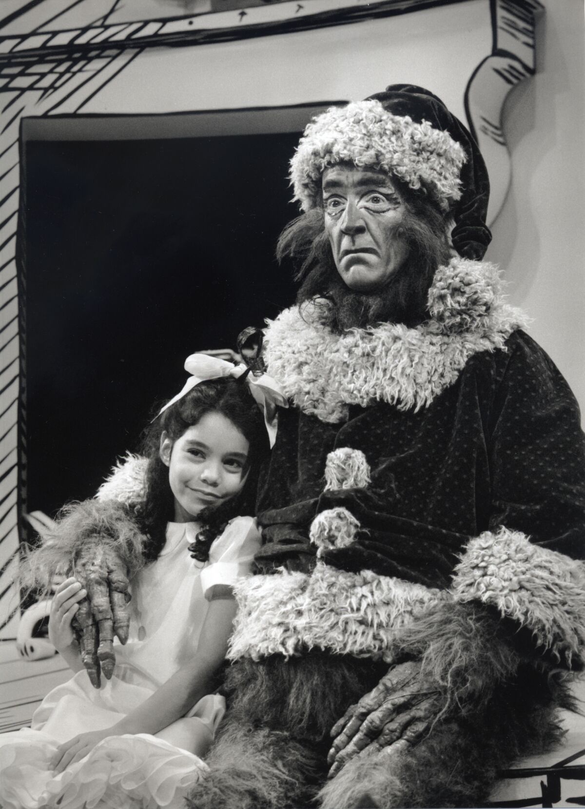 Actor Guy Paul, right, and Vanessa Hudgens in "Dr. Seuss's How the Grinch Stole Christmas" in 1998.