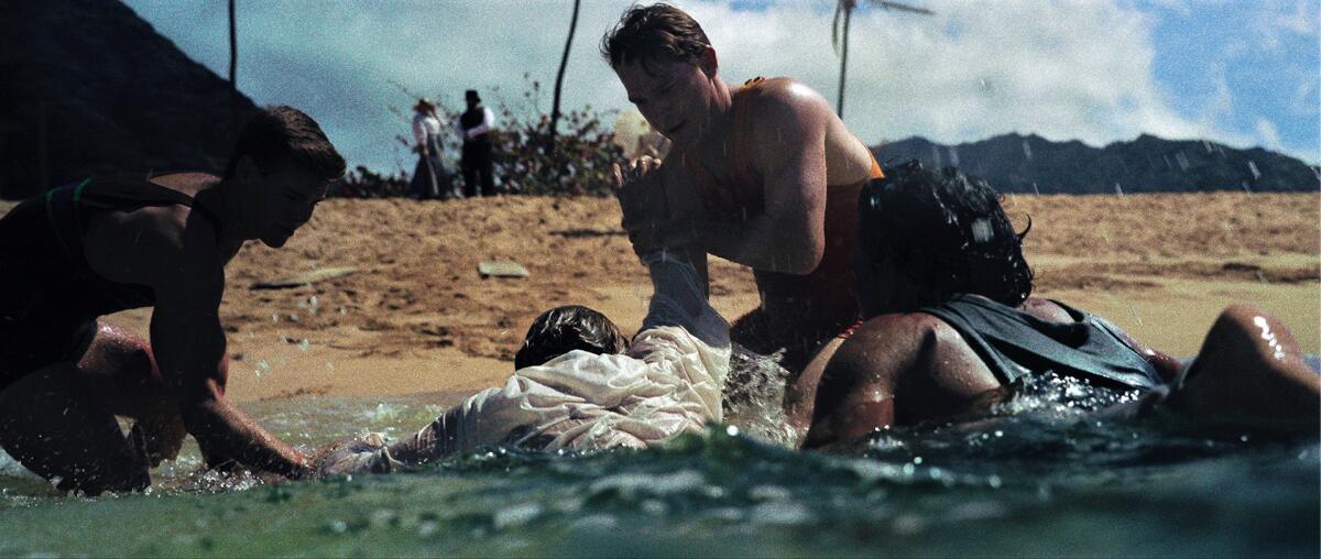 A still from the movie "Waterman" depicting a 1925 rescue at Corona del Mar Beach.