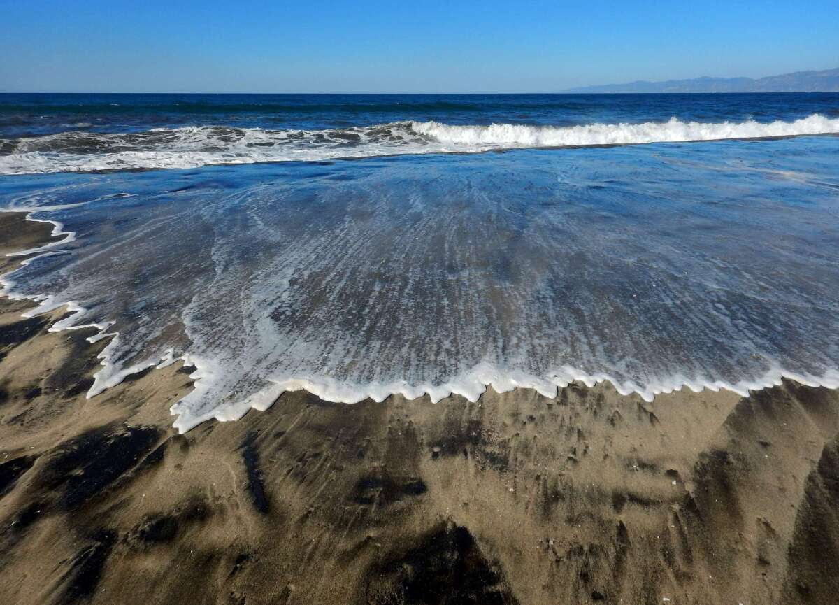 The tide rises at Playa Del Rey Beach last month. King tides are expected in California this week.