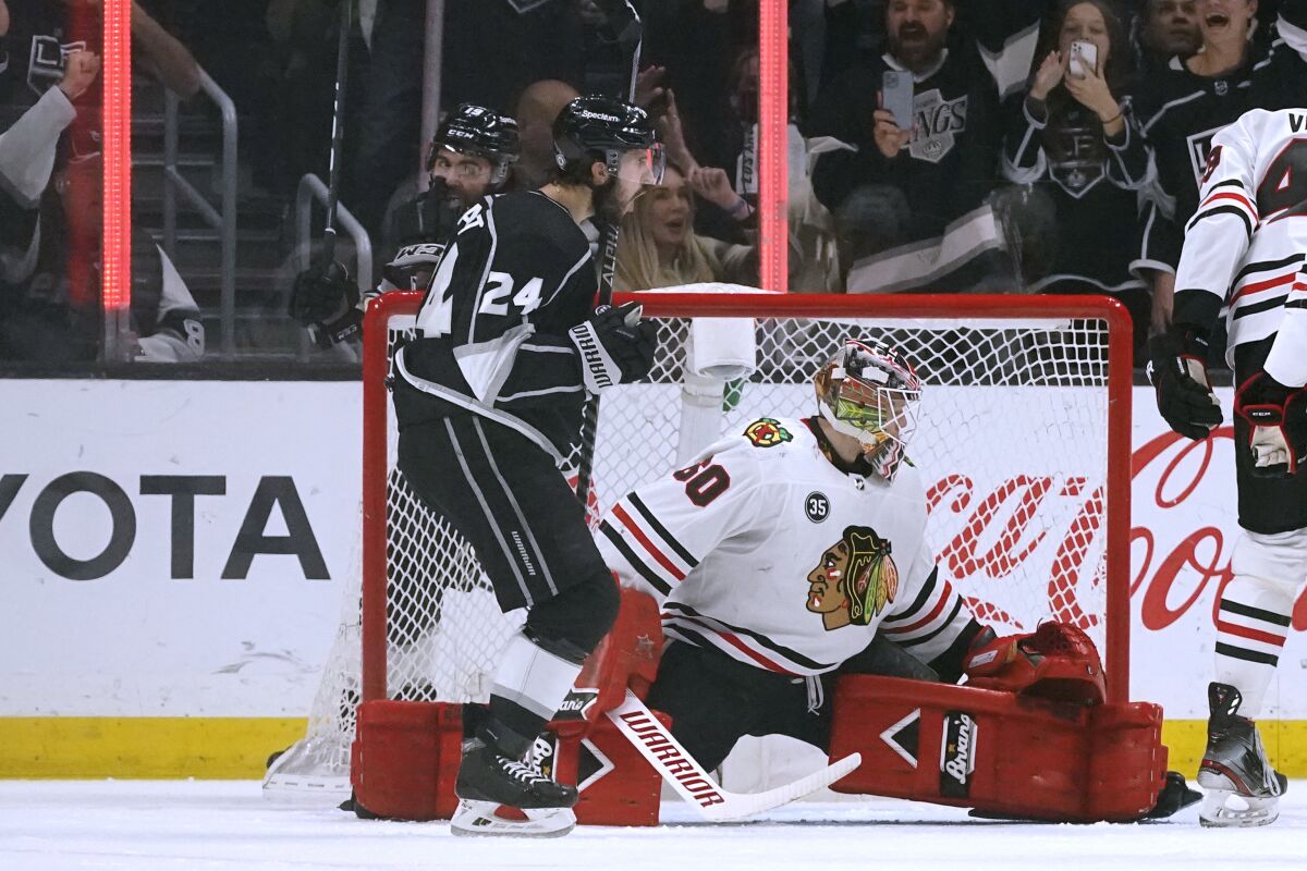 Phillip Danault celebrates after scoring past Chicago goaltender Collin Delia during the first period.