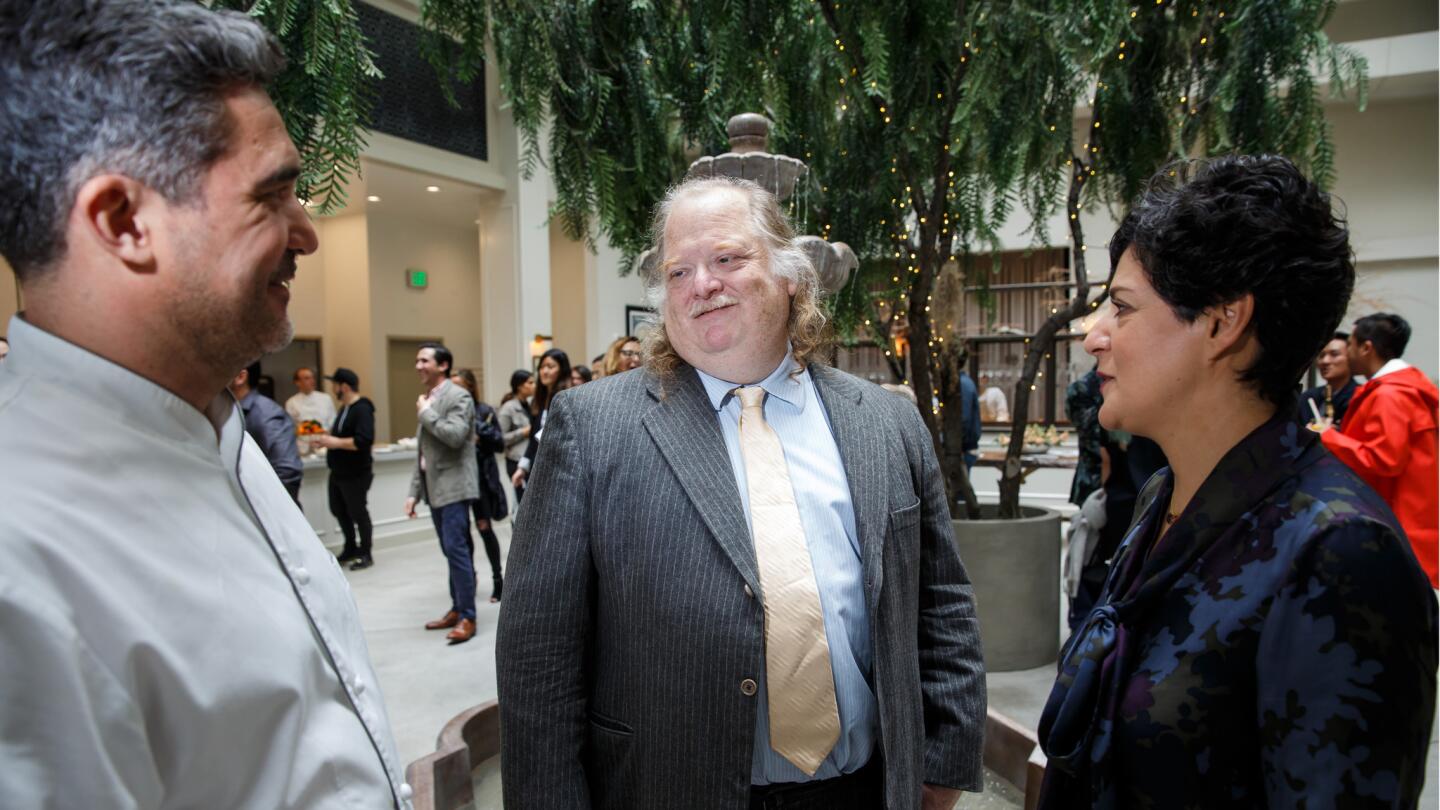 Pulitzer Prize-winning critic Jonathan Gold talks to Spring co-owners Tony Esnault and Yassmin Sarmadi at the LA Times' Food Bowl event held at the downtown restaurant.