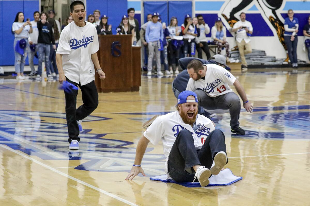 Dodgers third baseman Justin Turner plays a game while visiting Saugus High School with his teammates on Friday.