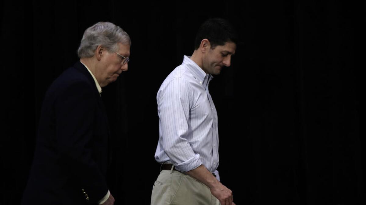 Senate Majority Leader Mitch McConnell (R-Ky.) and House Speaker Paul D. Ryan (R-Wis.) walk together.