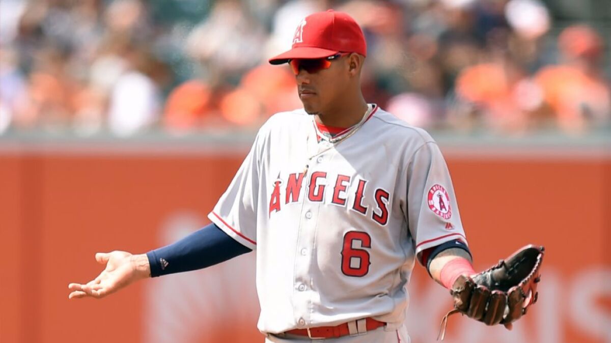Angels infielder Yunel Escobar reacts after getting ejected during a game earlier this season. The big question now is whether the Angels will keep him or trade him.