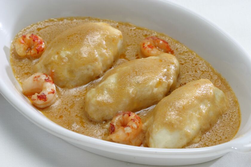 Feather light, fluffy fish dumplings bathed in a creamy, intense shellfish sauce. Recipe: Quenelles Nantua