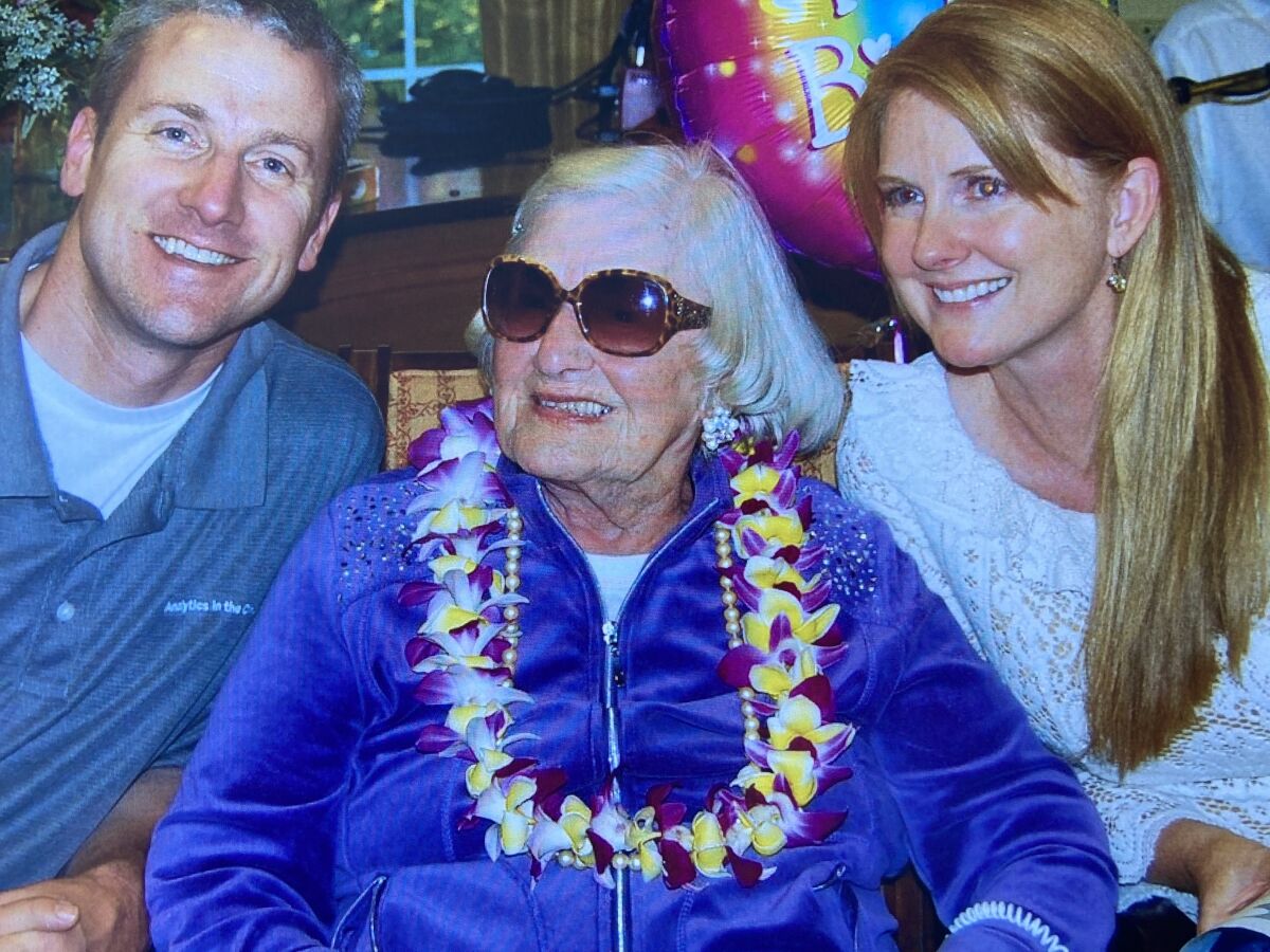 Janette Lalor, pictured during her 100th birthday celebration with her granddaughter and grandson-in-law.