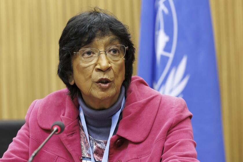 FILE - Former U.N. High Commissioner for Human Rights Navi Pillay, Chair commissioner of the Independent International Commission of Inquiry on the Occupied Palestinian Territory, including East Jerusalem, and Israel, delivers her remarks, during a meeting at the European headquarters of the United Nations in Geneva, Switzerland, Monday, March 20, 2023. U.N.-backed human rights experts say in a report issued Wednesday, June 12, 2024, that Israeli forces and Palestinian militants engaged in sexual and gender-based violence during the first months of the Israel-Hamas war. The report, which covered the time between the Oct. 7, 2023 rampage and the end of last year, laid out a wide array of alleged rights violations and crimes by both sides during the conflict. (Salvatore Di Nolfi/Keystone via AP, File)