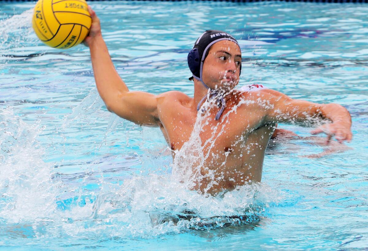 Newport Harbor's Kai Kaneko (21) shoots for a penalty shot goal against Harvard-Westlake on Saturday.