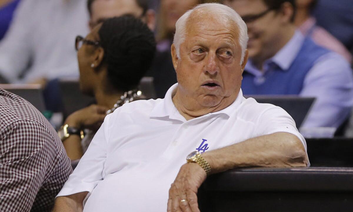 Former Dodgers manager Tom Lasorda sits courtside during the Clippers' road win Tuesday over the Phoenix Suns.