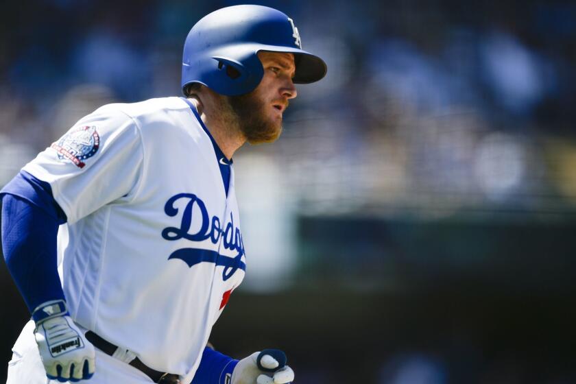 Los Angeles Dodgers' Max Muncy rounds the bases after hitting a home run during the fifth inning of a baseball game against the Atlanta Braves in Los Angeles, Sunday, June 10, 2018. (AP Photo/Kelvin Kuo)