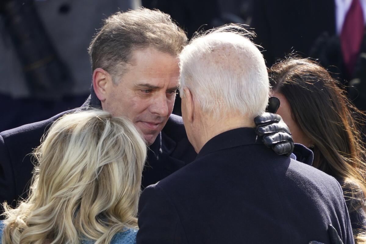 President Joe Biden hugs first lady Jill Biden, his son Hunter Biden. (AP Photo/Carolyn Kaster, File)