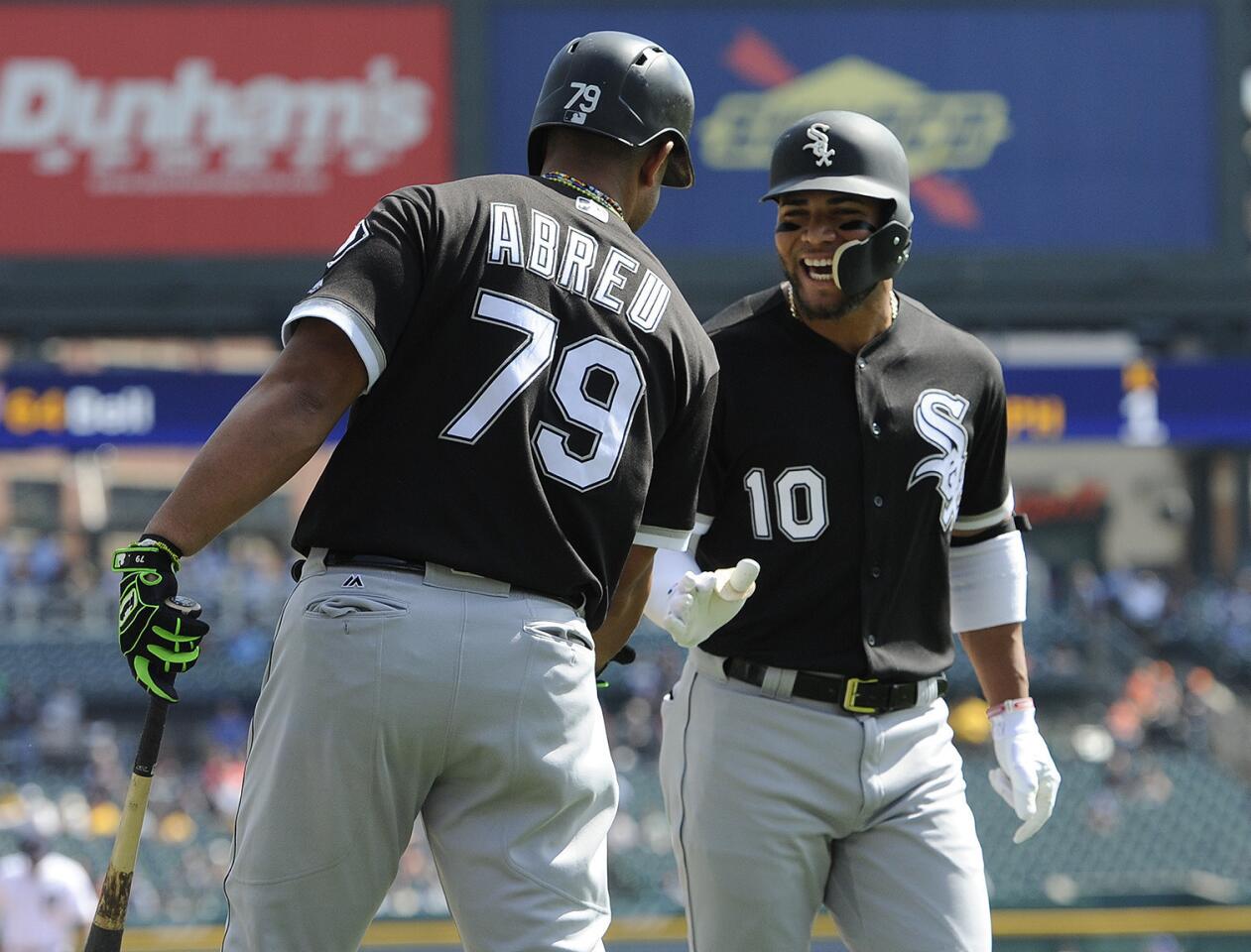 Yoan Moncada (10) is congratulated by Jose Abreu (79) after hitting a home run against the Tigers Thursday, Sept. 14, 2017, in Detroit.