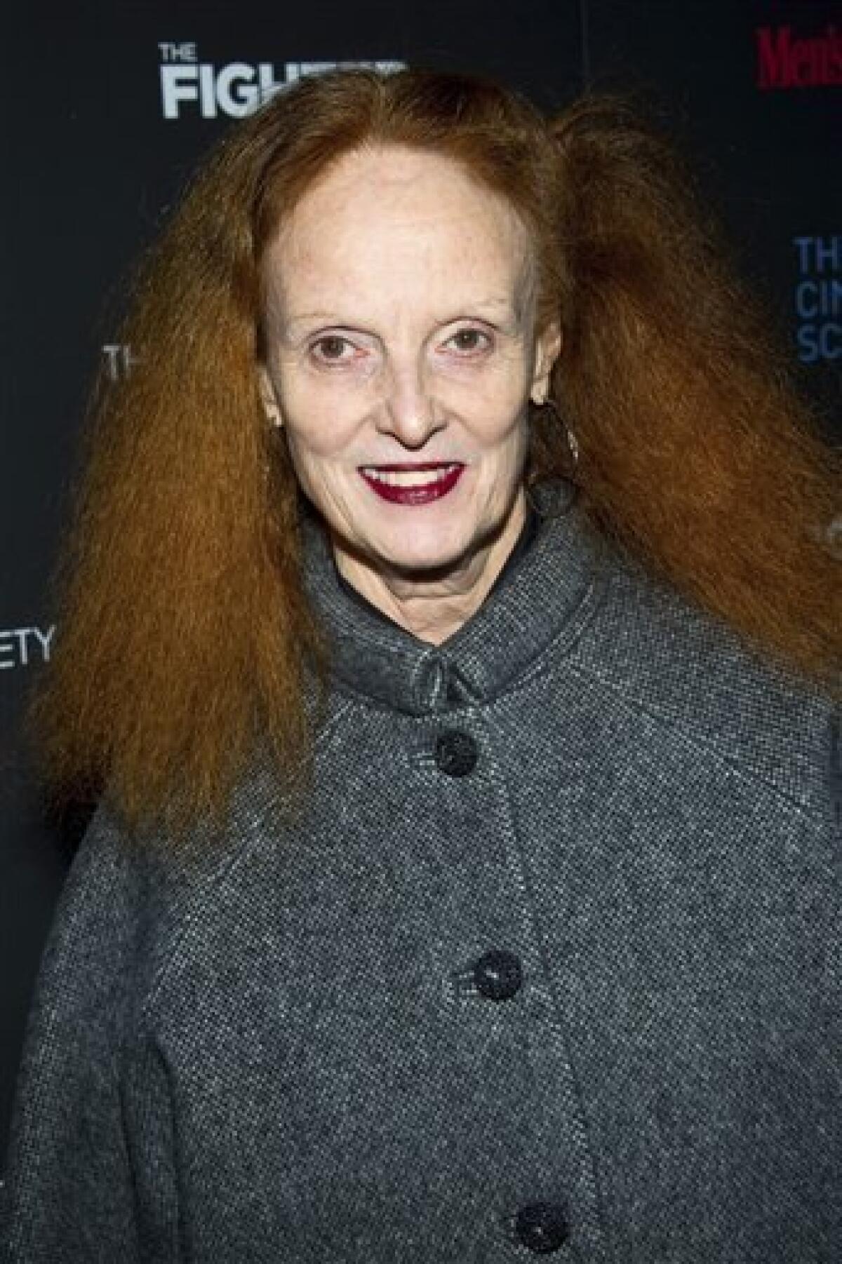 FILE- This Friday, Dec. 10, 2010 file photo shows Grace Coddington, the creative director of Vogue, as she attends a screening of "The Fighter" hosted by The Cinema Society in New York. Coddington's story from the front row of fashion will be told in a memoir. The as-yet-untitled book with be written in collaboration with Vanity Fair style editor-at-large Michael Roberts, a longtime friend and colleague. It will include some of Coddington's own illustrations. (AP Photo/Charles Sykes)