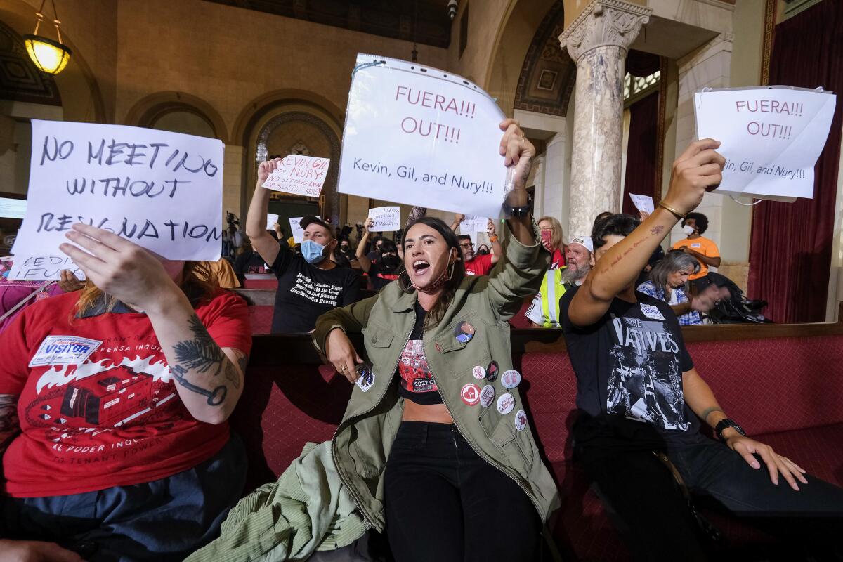People demand the resignation of three L.A. City Council members at City Hall on Oct. 12. 