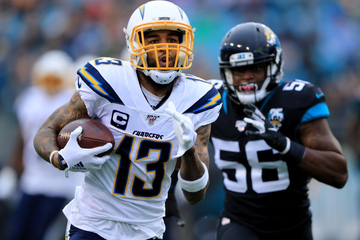 Chargers' Keenan Allen (13) rushes for yardage during the game against the Jacksonville Jaguars on Dec. 8 Jacksonville, Fla.