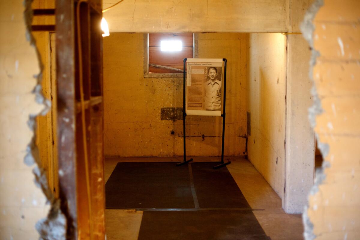 Toshio Kawano is shown in a photograph in the holding cell where he left inscriptions inside the high security jail at the Tule Lake Segregation Center.